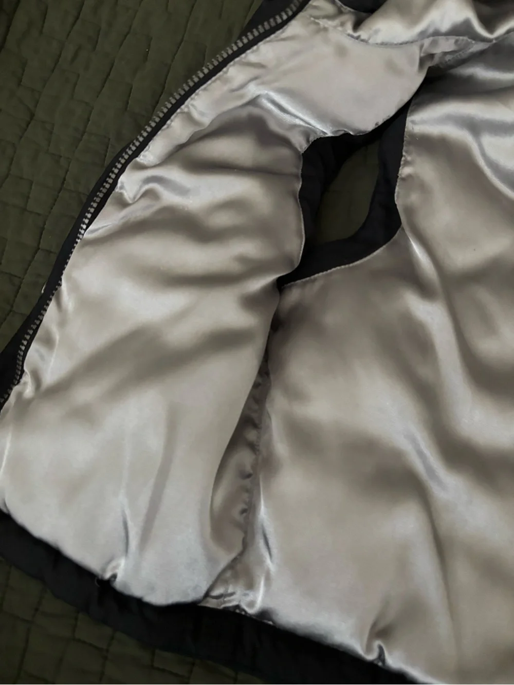 Columbia Kids Black Hooded Vest with Silver Lining and fleur-de-lis.